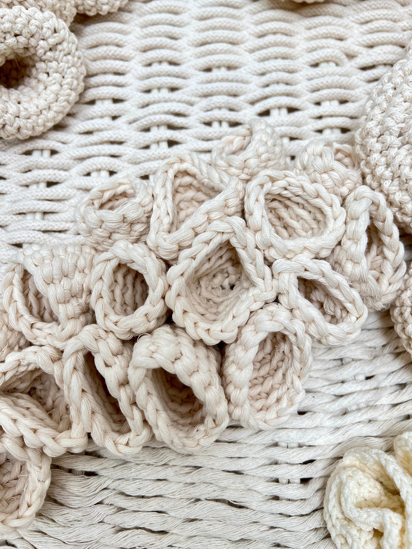 Close-up of textured woven tapestry with circular patterns