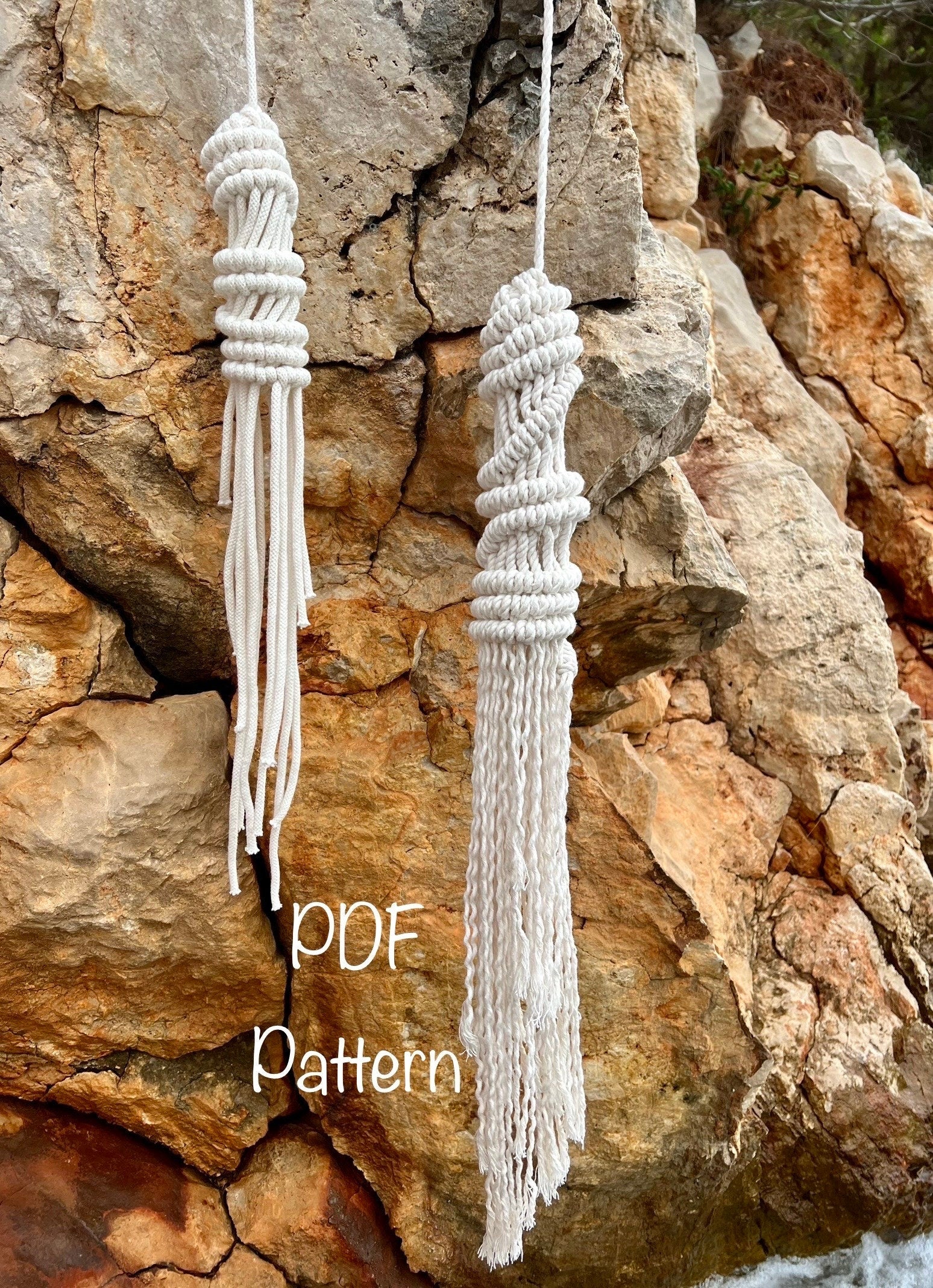 Two macrame tassels hanging against a rocky background with 'PDF Pattern' text.