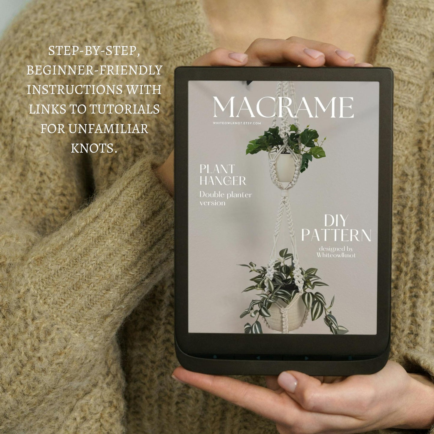 Person holding a tablet with a macrame pattern guide on the screen.