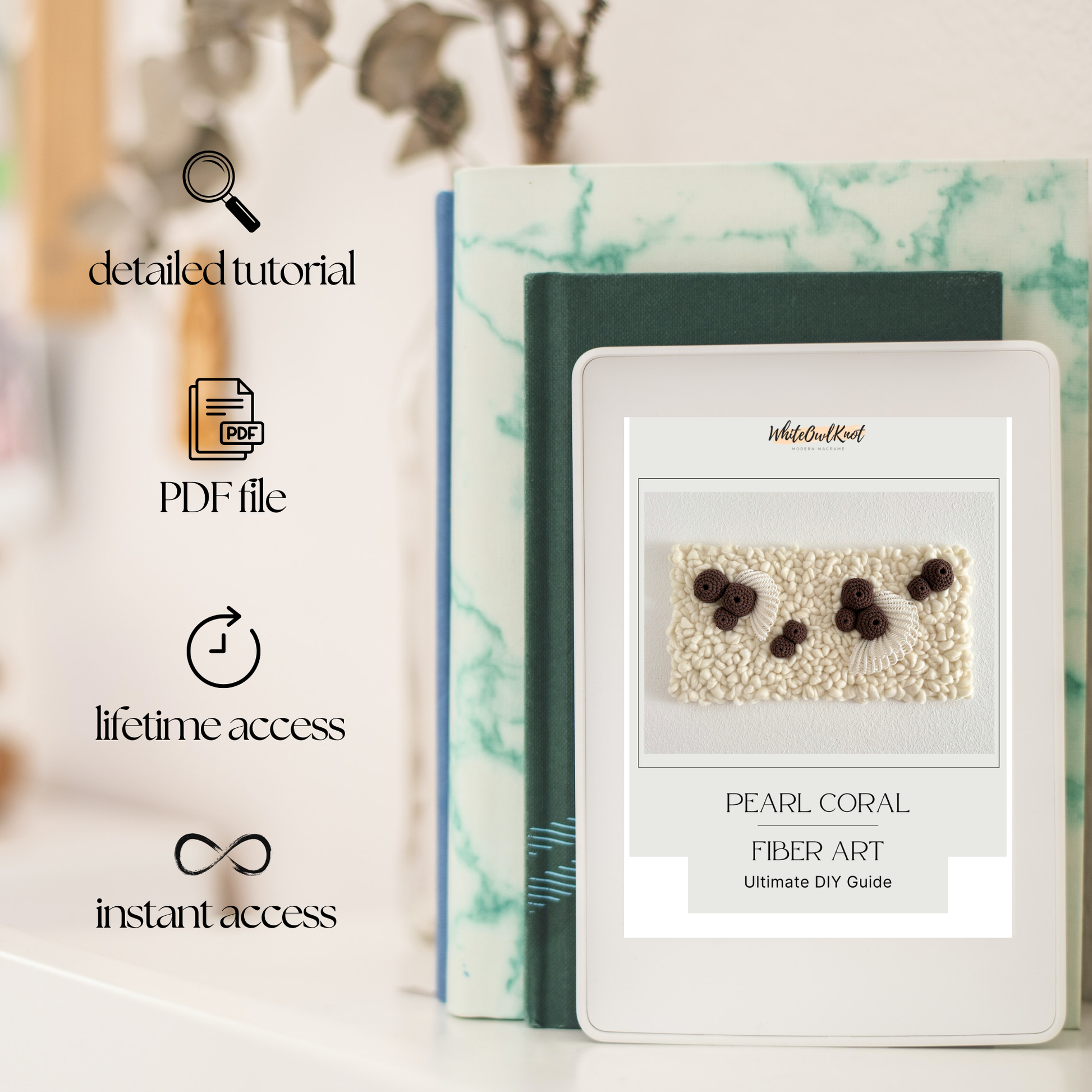 Pearl coral fiber art kit with a digital guide on a marble surface