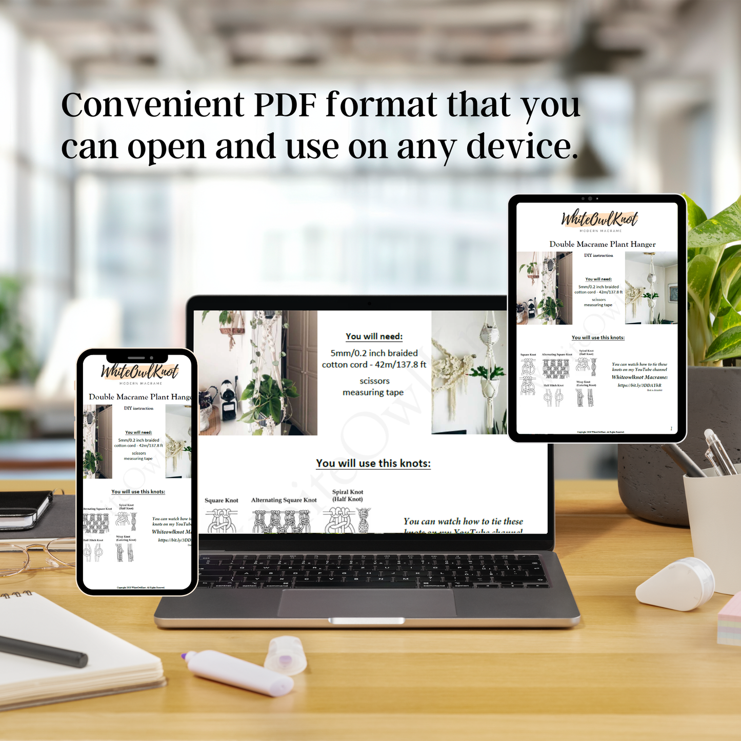 Laptop, tablet, and smartphone displaying a PDF on a desk with a blurred office background.