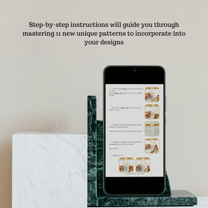Phone displaying a tutorial on a marble stand with text about unique patterns.