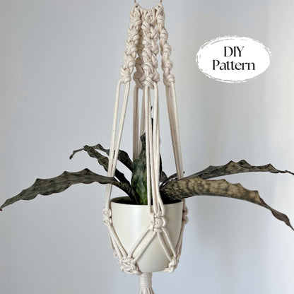 Macrame plant hanger with a plant on a plain background, featuring 'DIY Pattern' text.