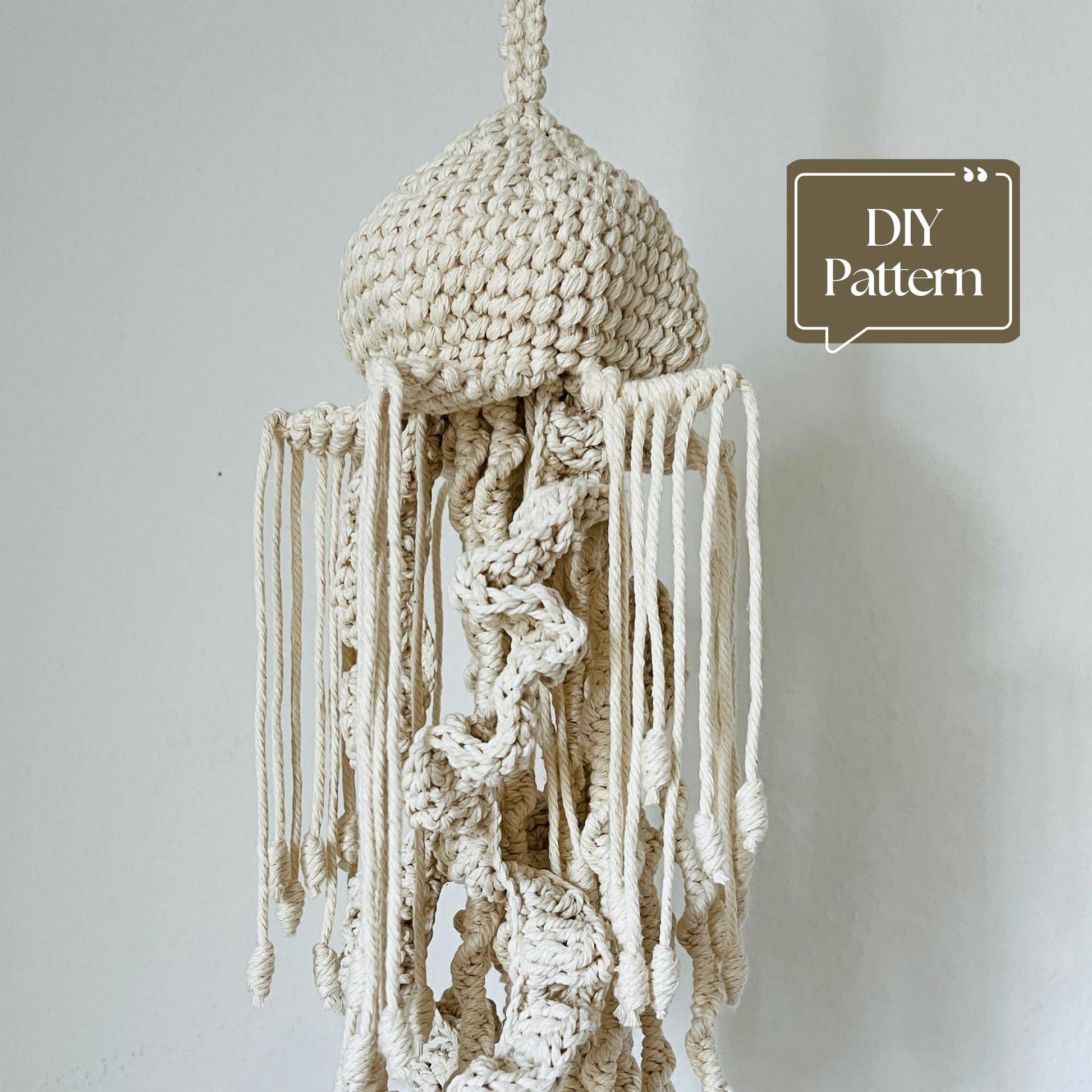 Macrame hanging decor Jellyfish with 'DIY Pattern' text on a plain background