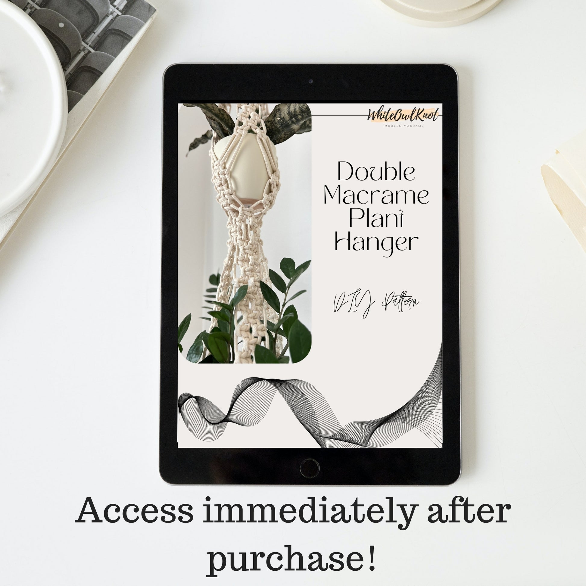 Digital product screen displaying a macrame plant hanger pattern with text 'Double Macrame Plant Hanger' on a tablet.