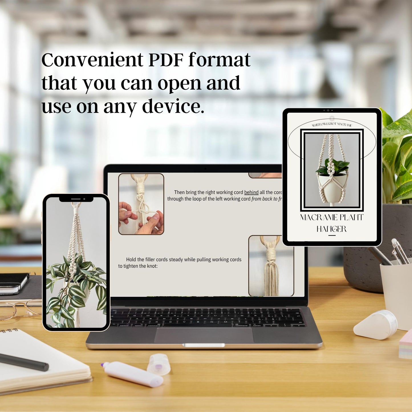 Laptop, phone, and tablet displaying a PDF on a desk with a blurred office background.