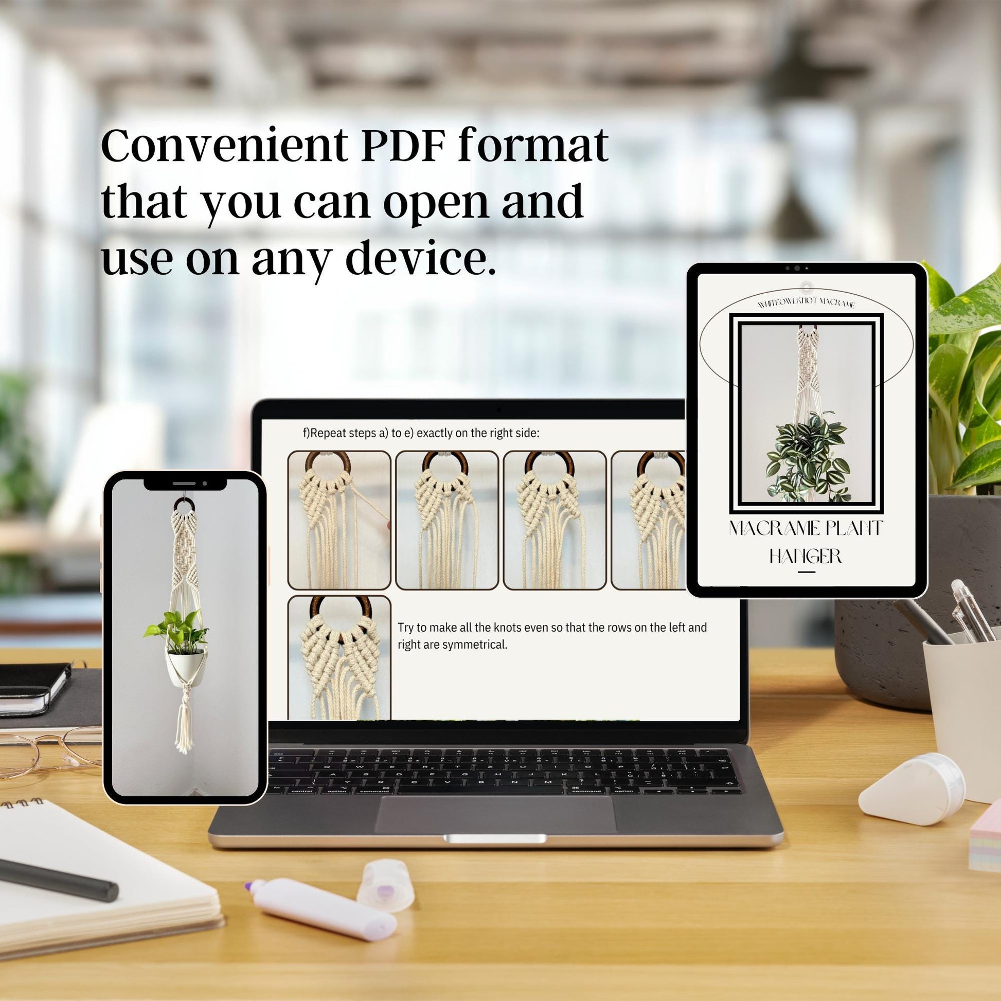 Laptop, smartphone, and tablet displaying a PDF on a desk with a blurred office background.