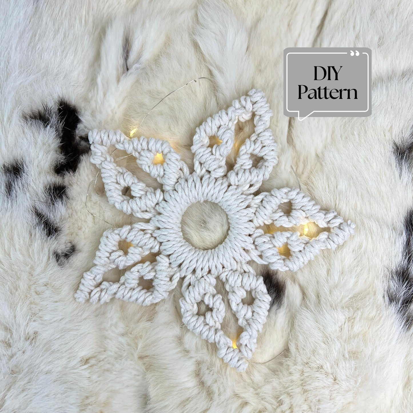 Macrame snowflake ornament on a textured white background with 'DIY Pattern' text.