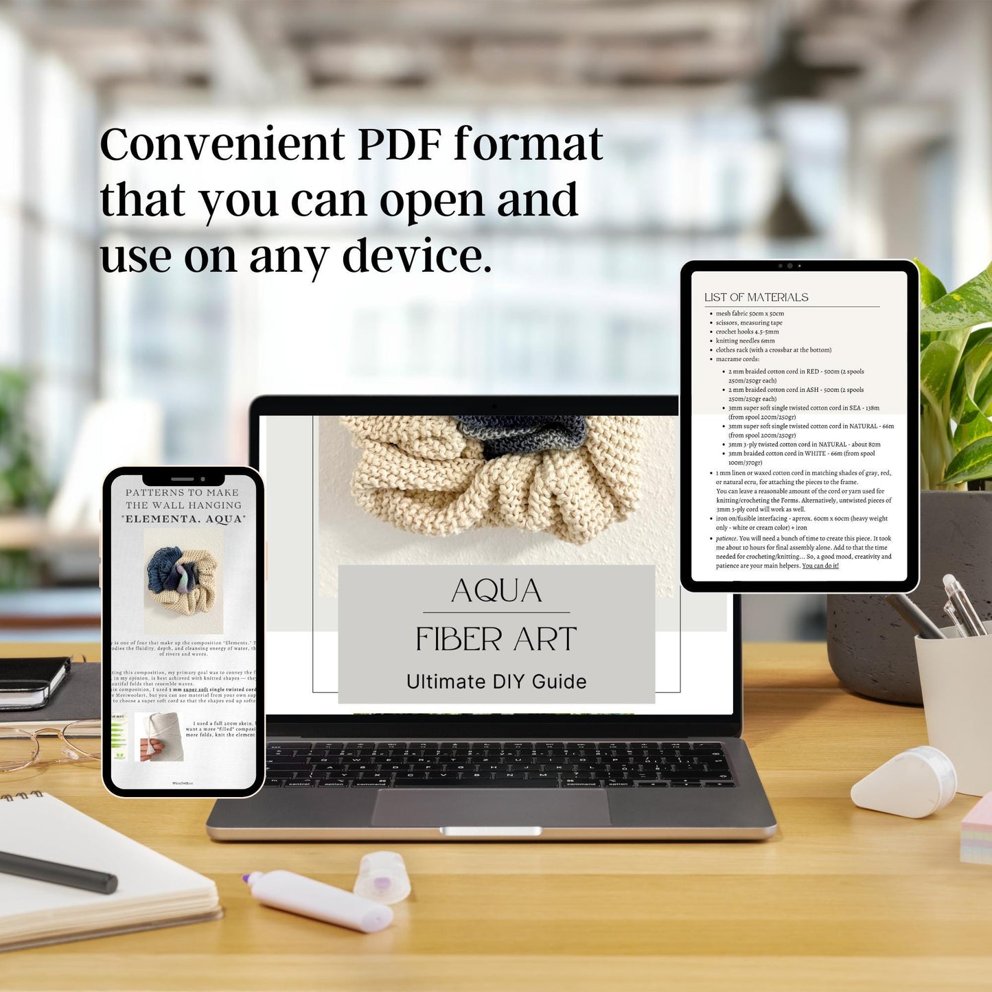 Laptop, smartphone, and tablet displaying fiber art guides on a desk with blurred office background.