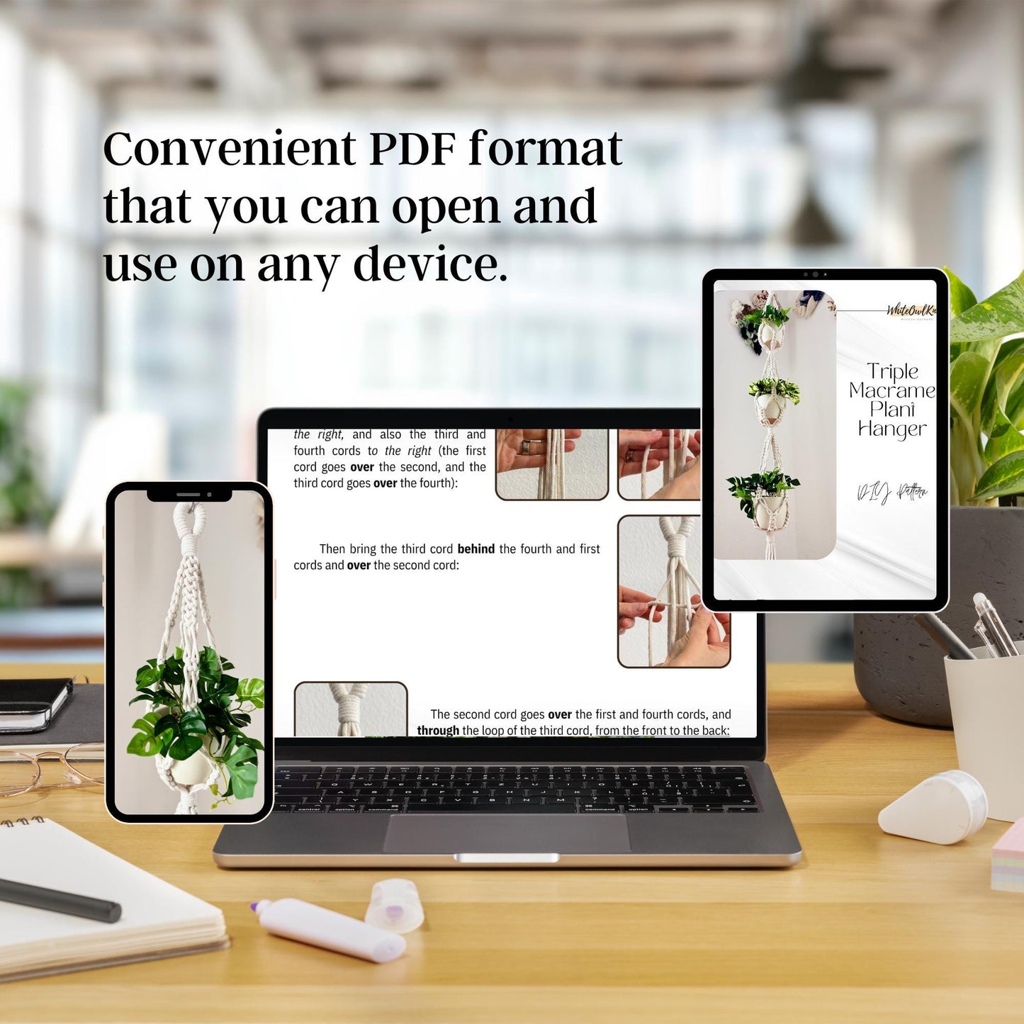 Laptop displaying a PDF with images of a plant hanger on a desk.