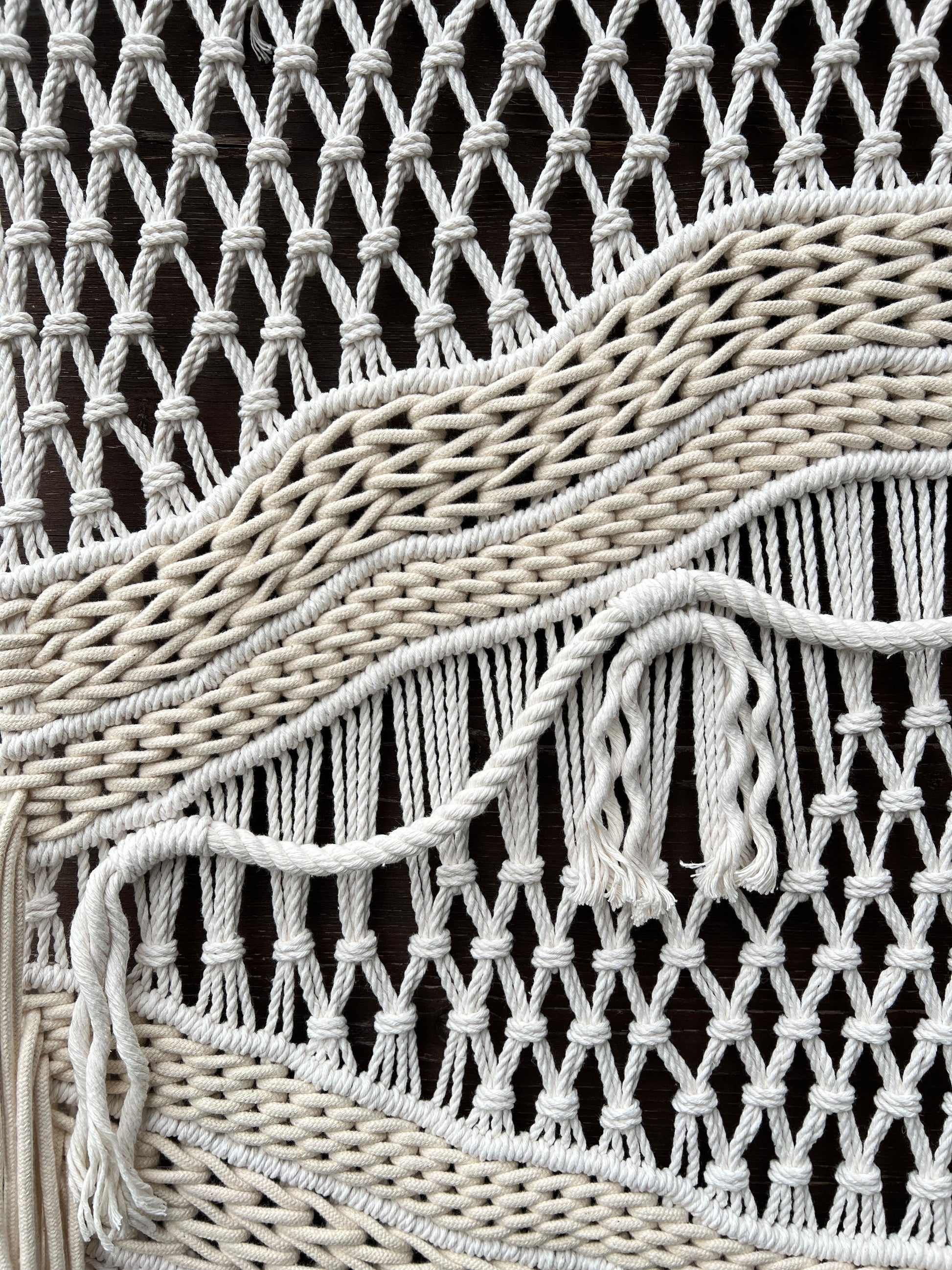 Close-up of a woven textured surface with a focus on the pattern and texture.