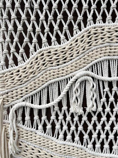Close-up of a woven textured surface with a focus on the pattern and texture.