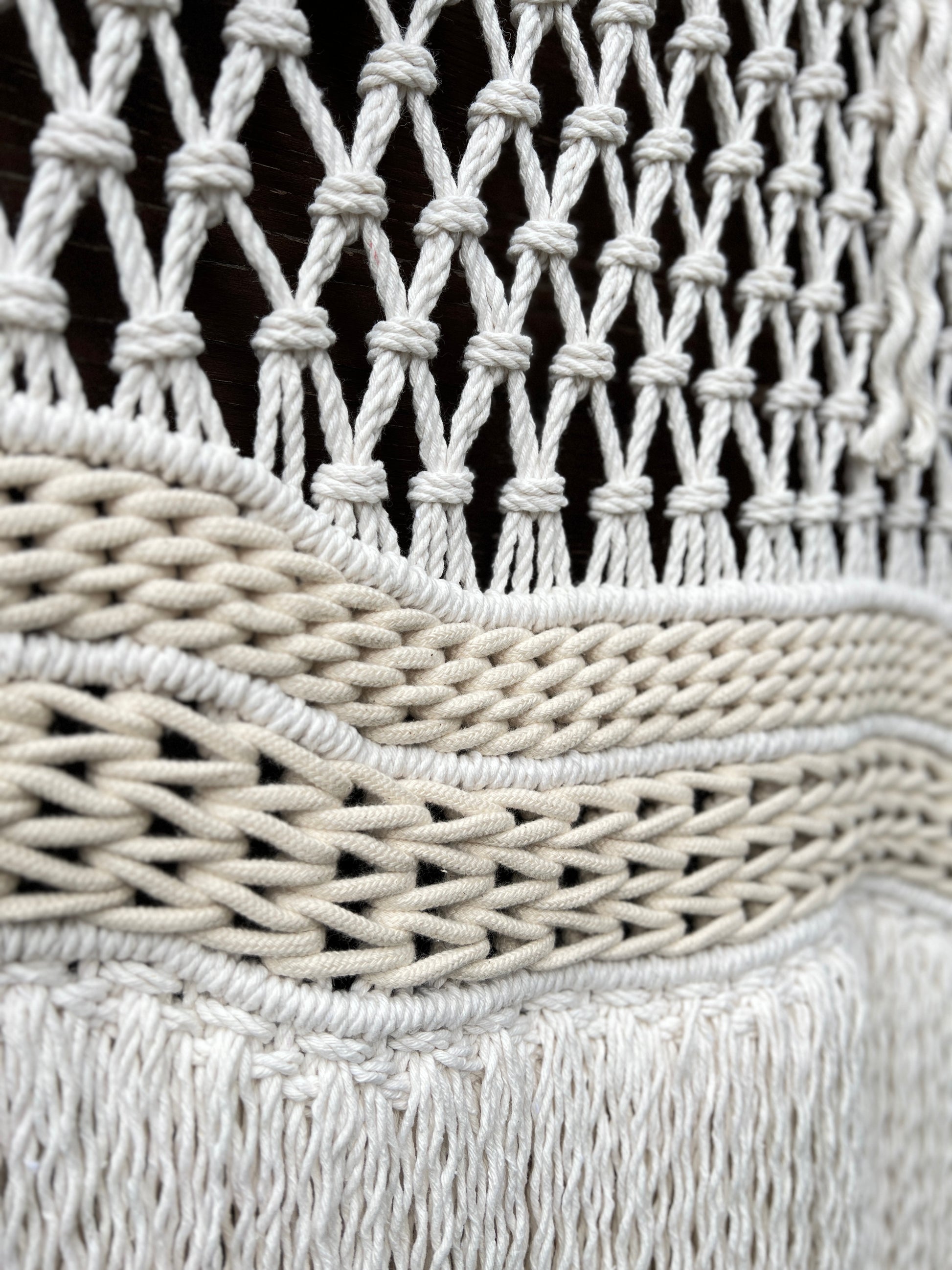 Close-up of woven texture with white and gray colors