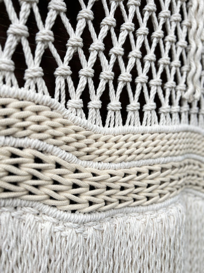 Close-up of woven texture with white and gray colors