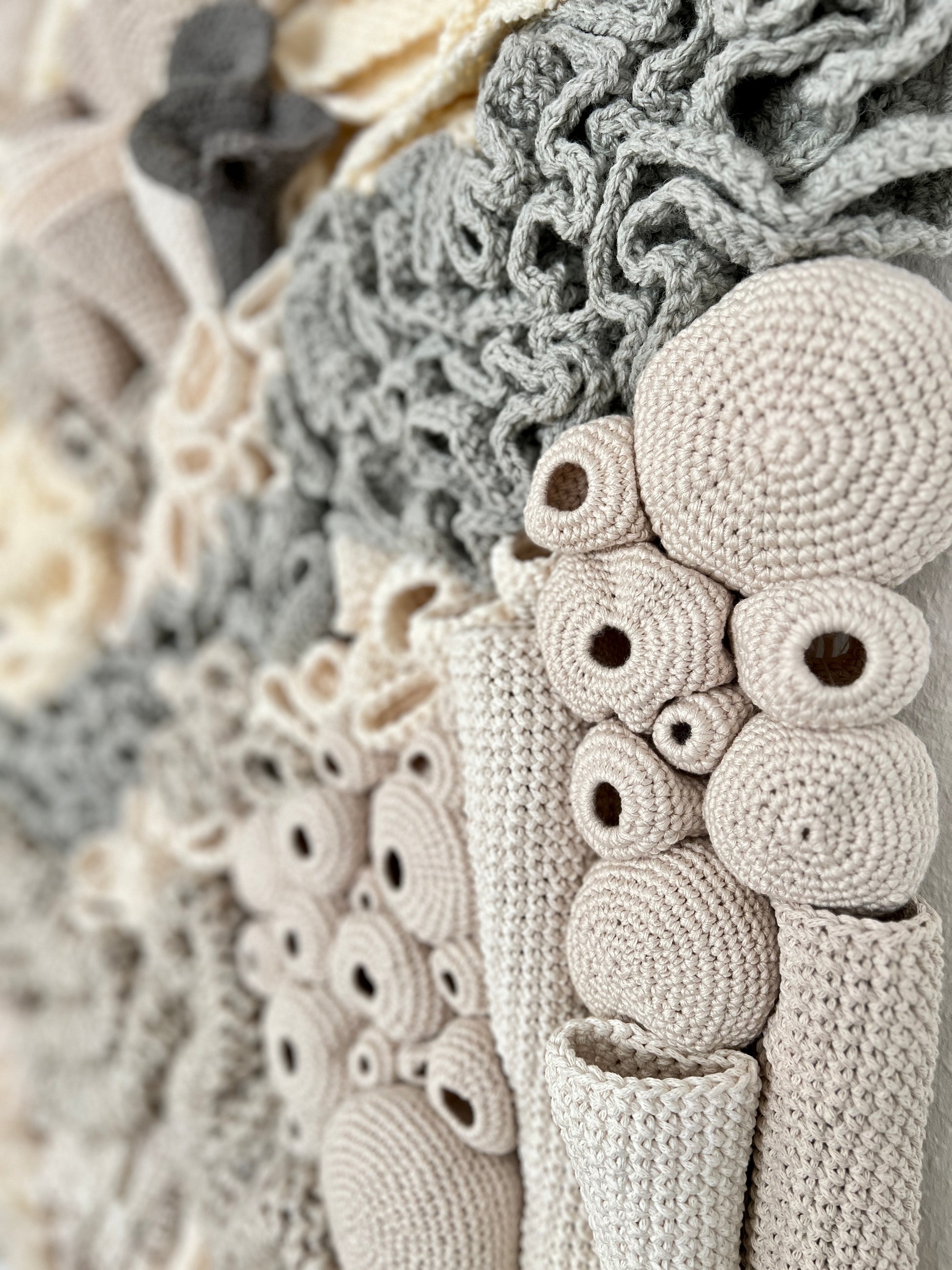 Textured wall art with organic shapes in neutral tones