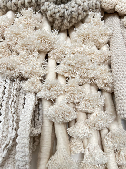 Close-up of textured beige fabric with various patterns