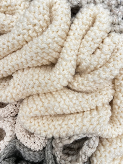 Close-up of textured white fabric with a subtle pattern