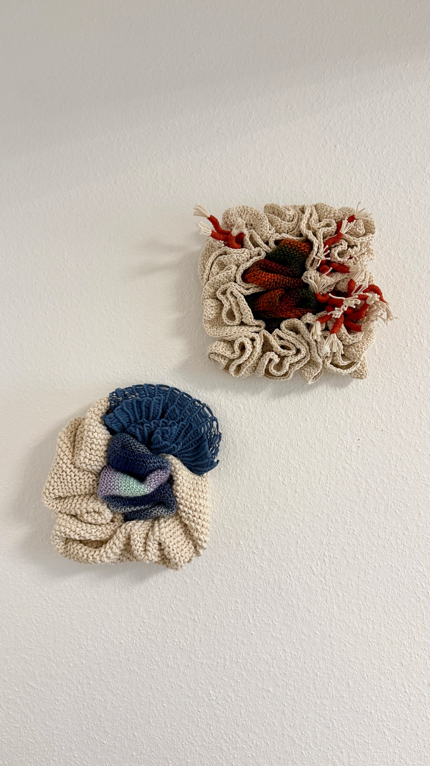 Two knitted or crocheted items on a white background
