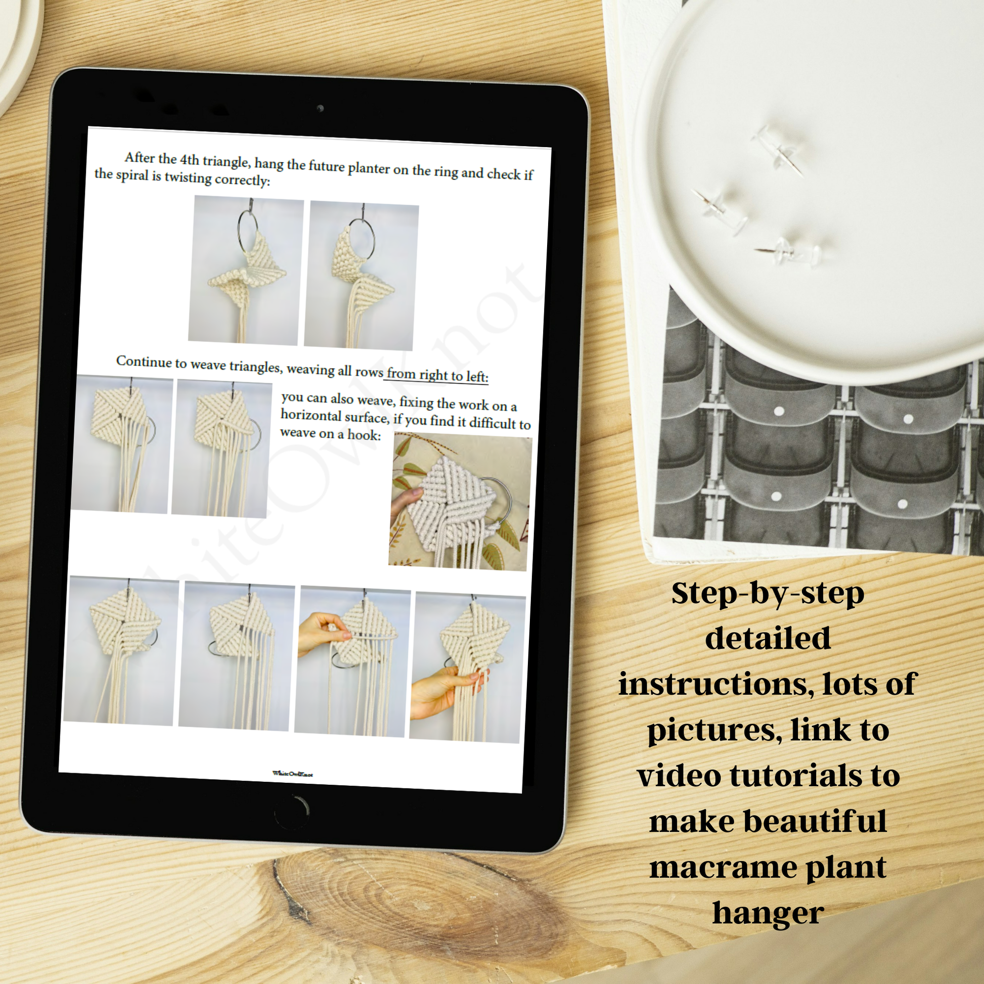 iPad displaying a macrame plant hanger tutorial on a wooden surface with a candle.