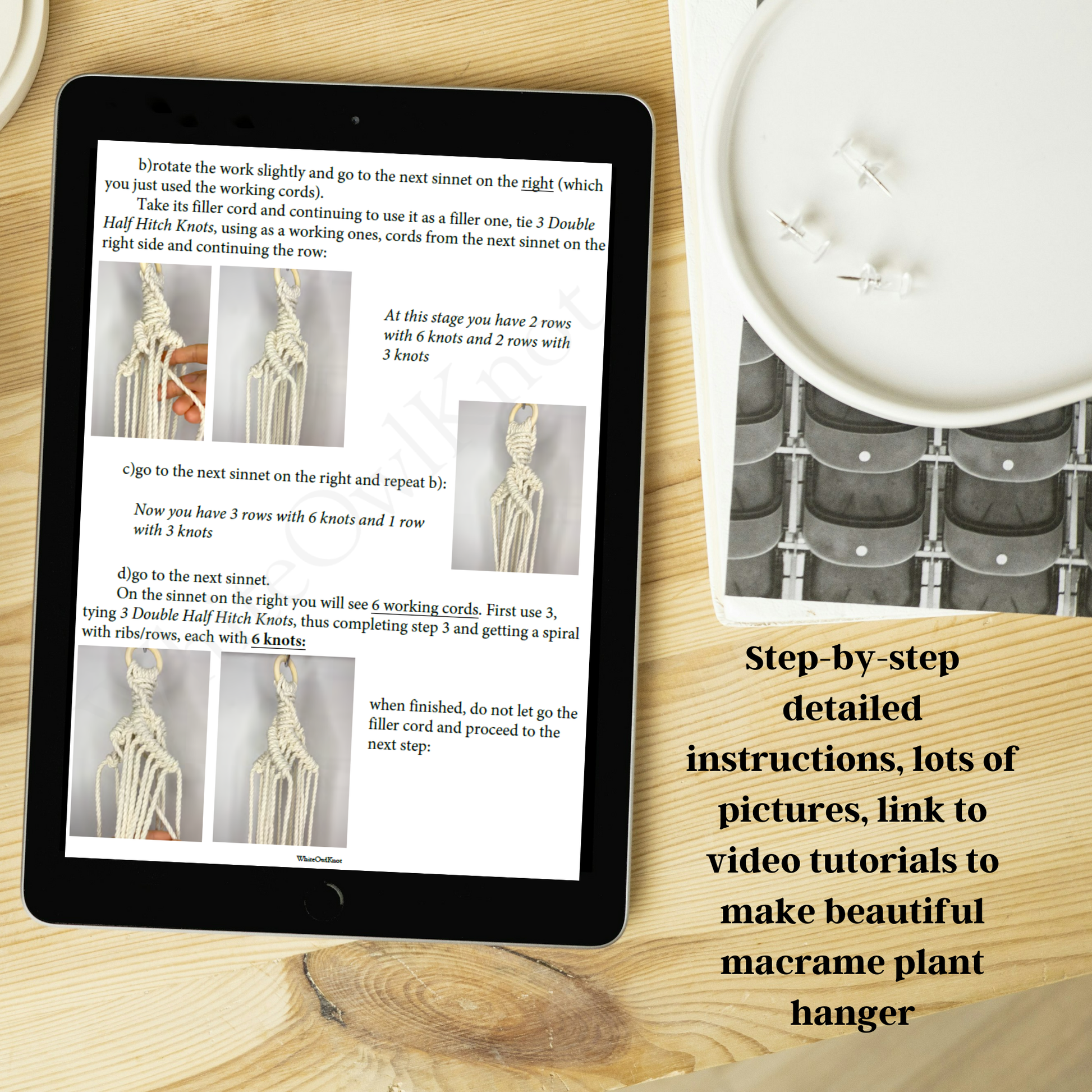 Tablet displaying instructions for making a macrame plant hanger on a wooden surface with a candle.