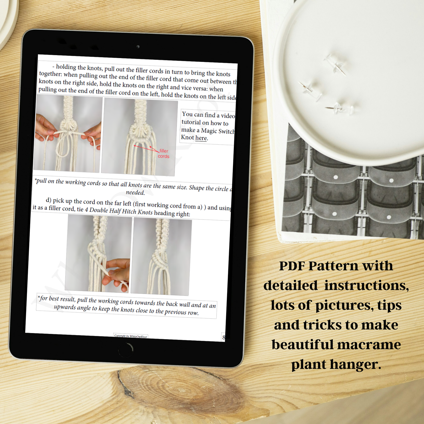 Tablet displaying a PDF pattern for macrame plant hanger with text and images on a wooden surface.