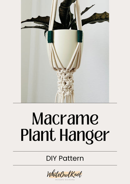 Macrame plant hanger with a plant on a light gray background, featuring the brand 'White Owl Knot'.