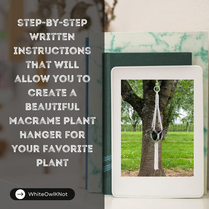 Macrame plant hanger displayed on a book with text overlay about step-by-step instructions.