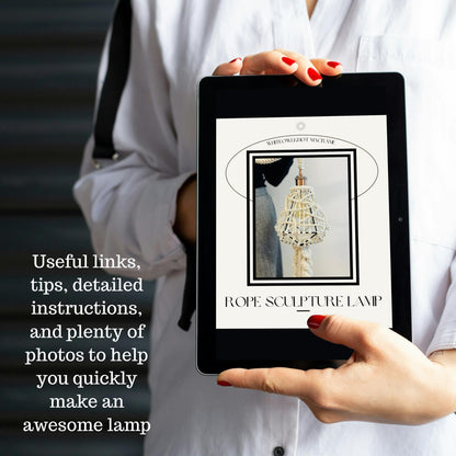 Person holding a tablet with a rope sculpture lamp design on a blurred background