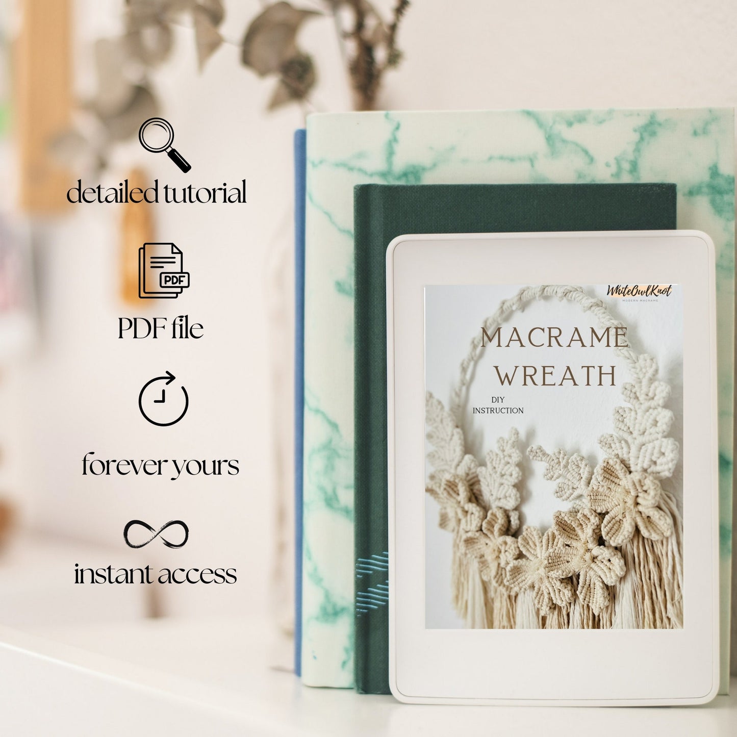 Macrame wreath instruction book with digital download options on a blurred background