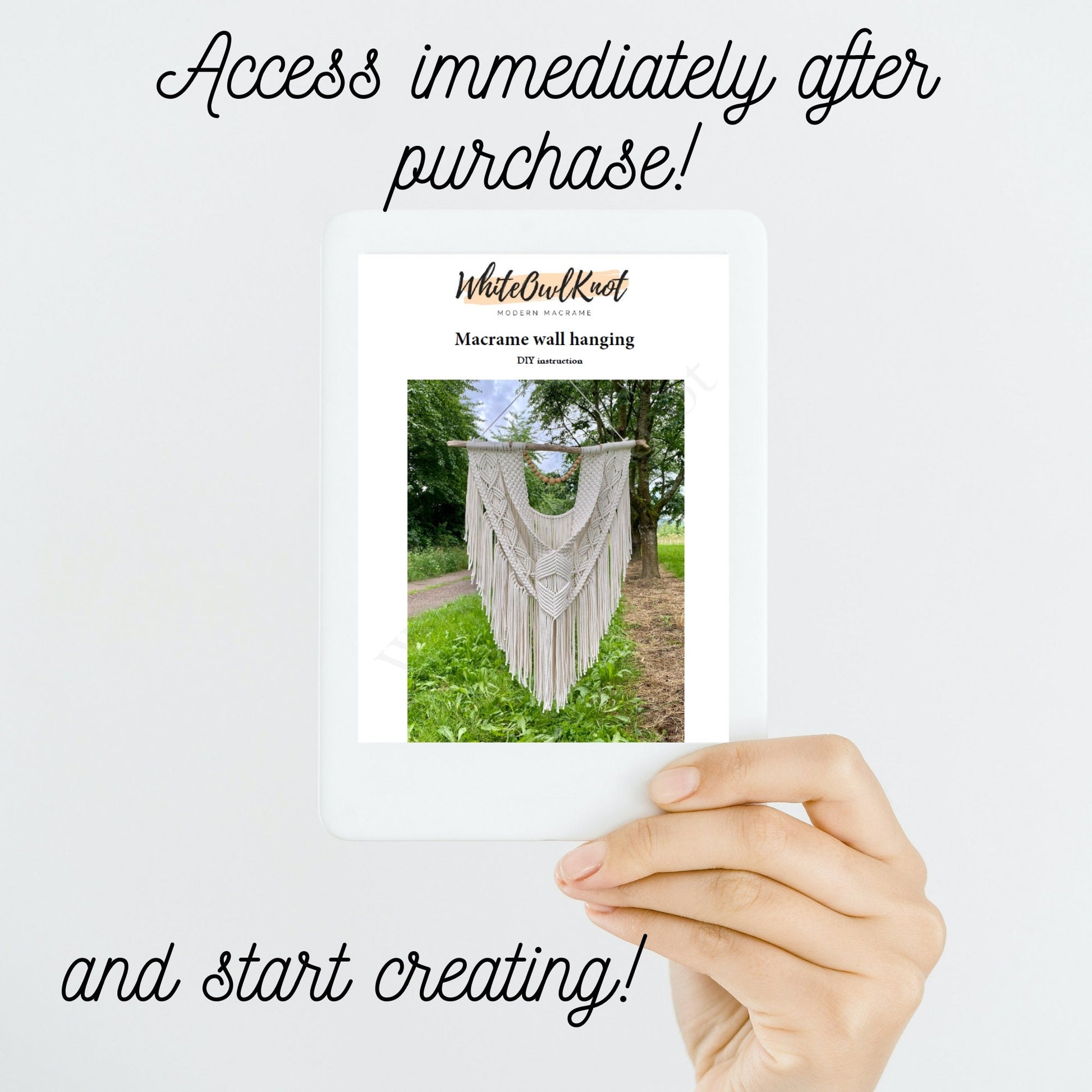 Hand holding a card with a macrame wall hanging image and promotional text on a white background