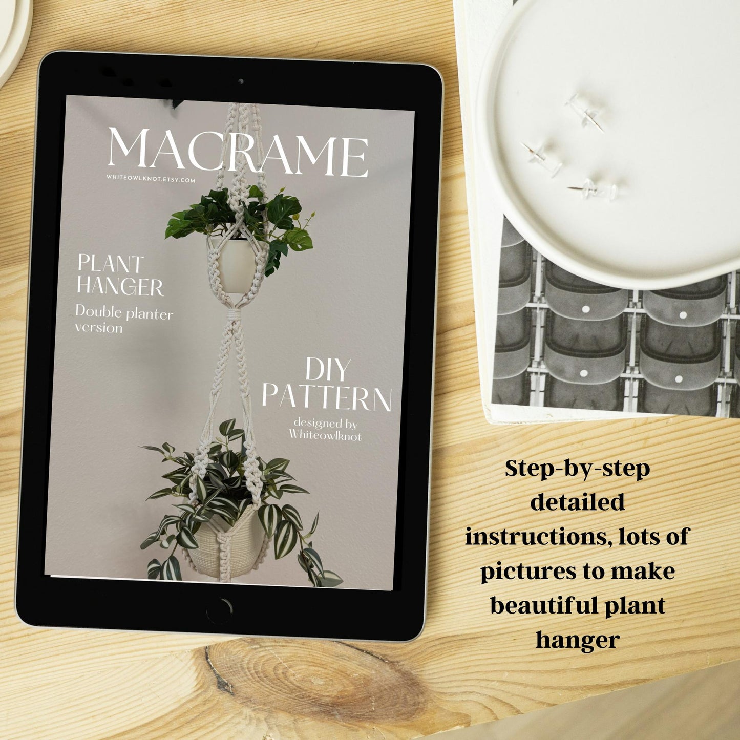 Tablet displaying a macrame plant hanger pattern on a wooden surface