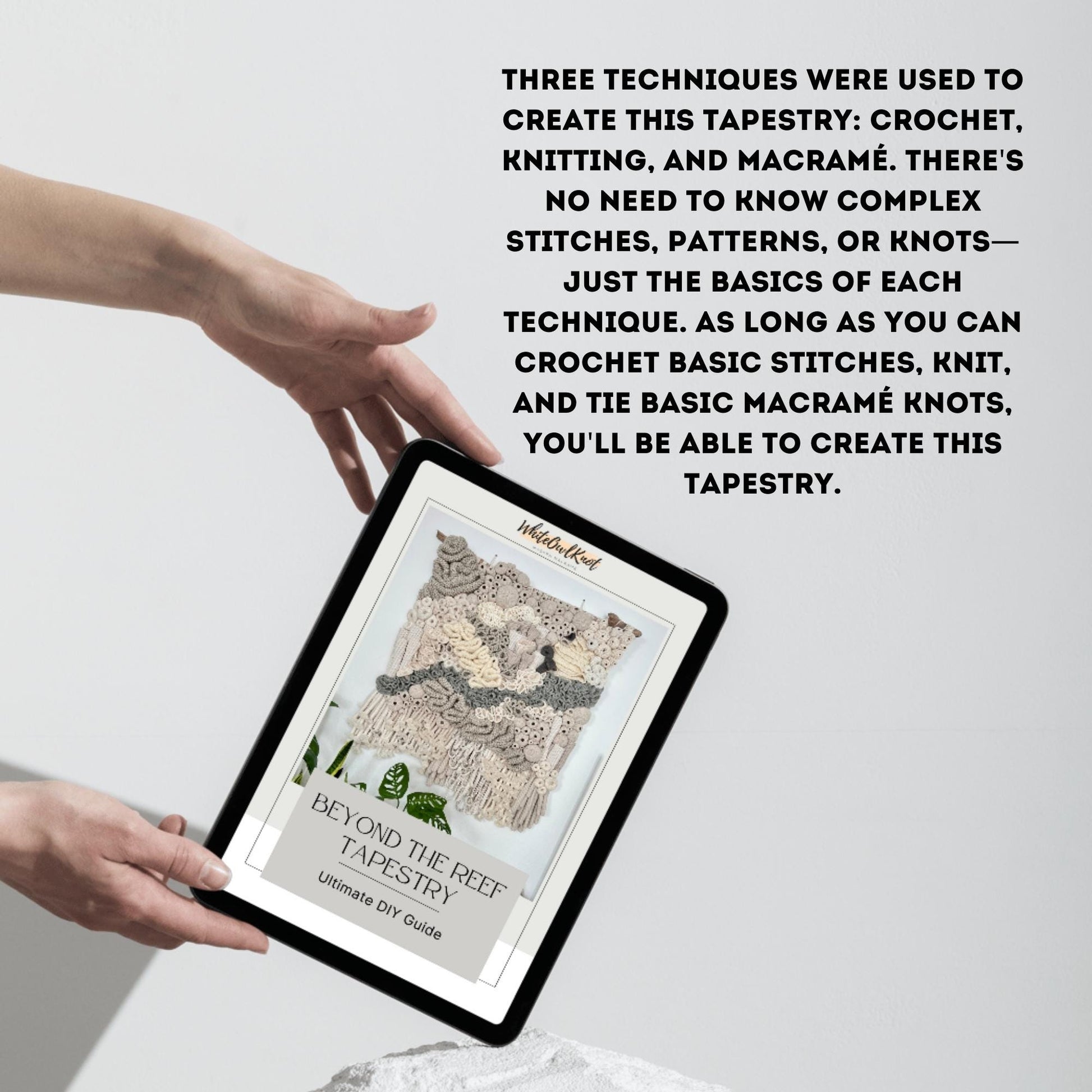 Person holding a tablet displaying a tapestry design with text about crochet, knitting, and macramé techniques.
