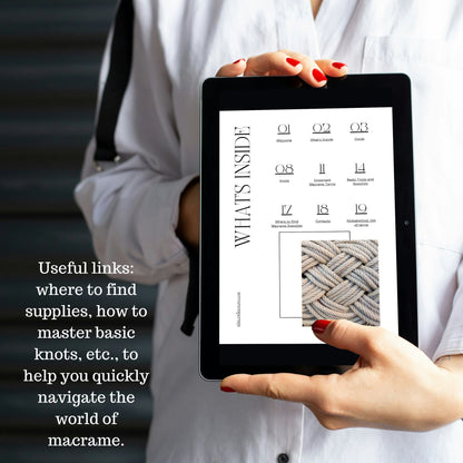 Person holding a tablet with a macrame tutorial on the screen