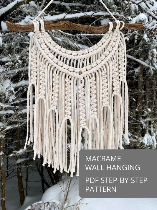 Macrame Wall Hanging pattern with detailed knotting, layered woven elements, and fringe, displayed as a finished macramé wall hanging.