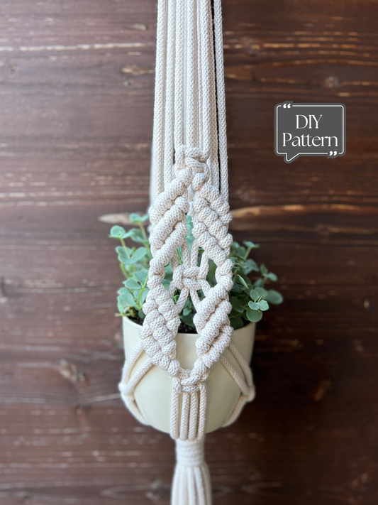 Macrame plant hanger with a plant against a wooden background, featuring 'DIY Pattern' text.