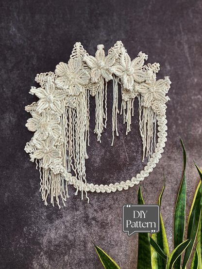 Decorative headband with floral details on a textured dark background