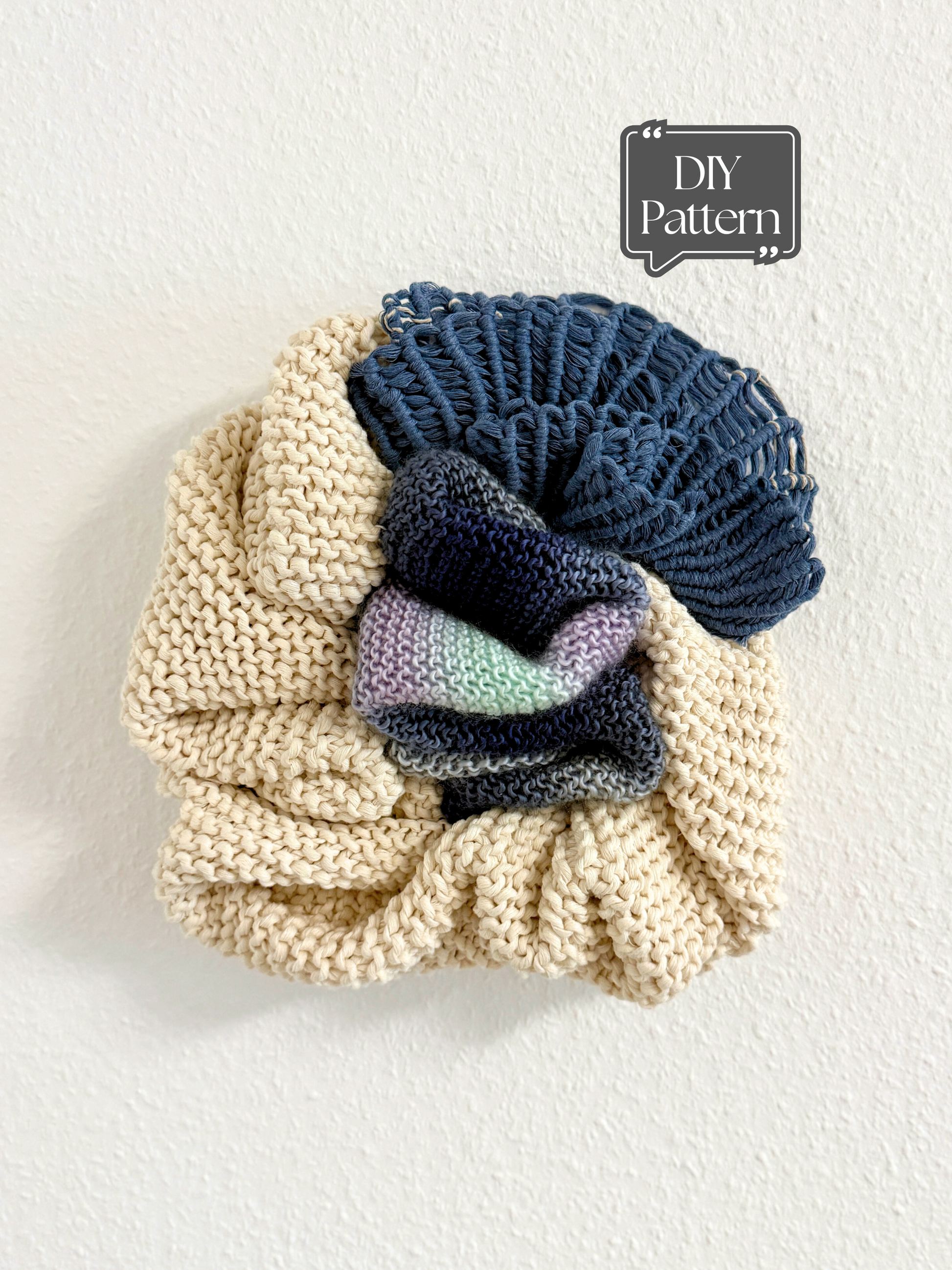 Knitted fiber art with a macrame detail on a white background, featuring 'DIY Pattern' text.