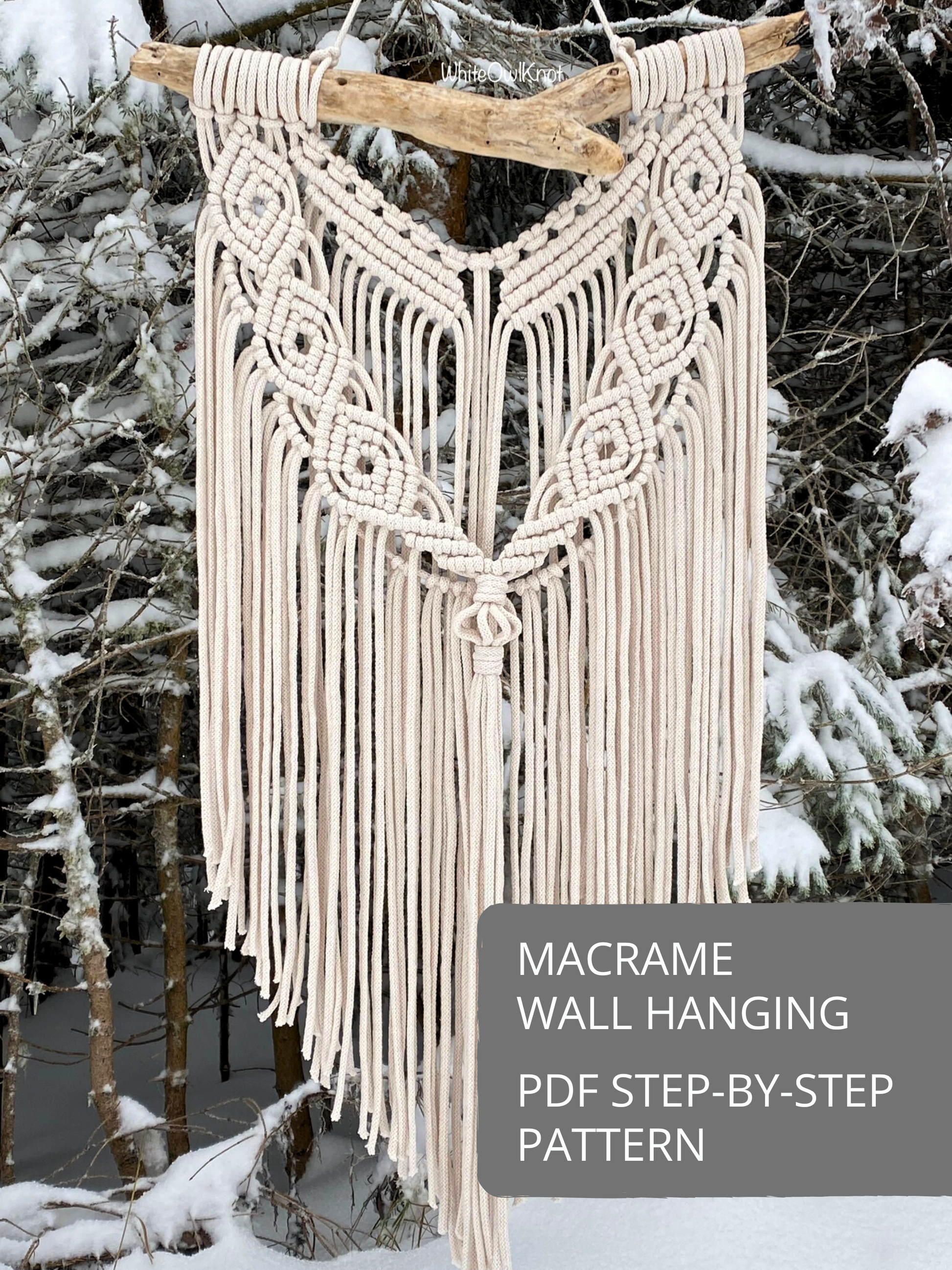 Macrame wall hanging DIY pattern with geometric knot design and long fringe, handmade boho macramé wall decor photographed outdoors in winter, step-by-step PDF tutorial pattern.