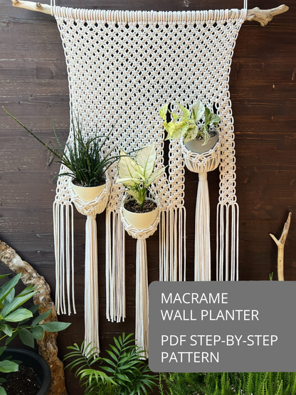 Macrame wall planter pattern with woven wall hanging design, multiple plant holders, and fringe, displayed as a finished macramé piece.